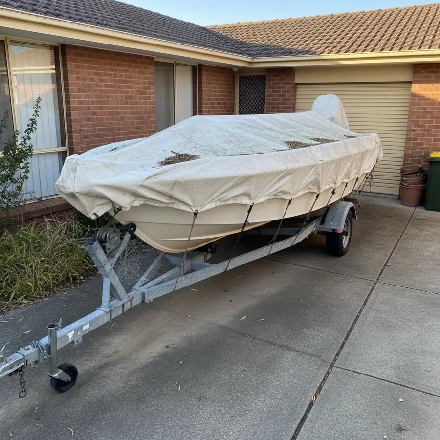 Boat stored on trailer in driveway - WA